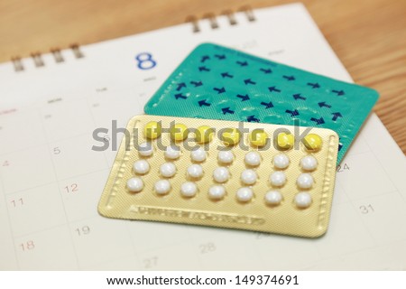 Birth Control Pills On A Calendar