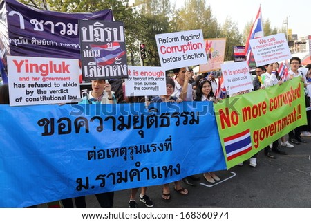 BANGKOK,THAILAND- DECEMBER  22: Unidentified protesters  need the reformation before election  at the Victory Monument. on December 22,2013 in Bangkok,Thailand.