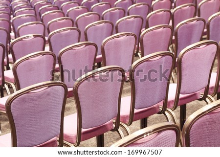 purple chairs in a conference room