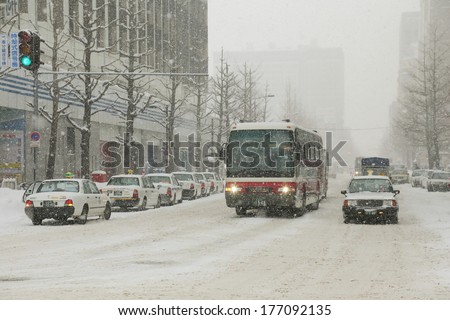 SAPPORO - FEBRUARY 11 : The heaviest snow  in Sapporo in Japan  on February 11, 2014 in Sapporo Japan. This severe snow storm has killed 19 people and caused more than 1,600 injured around the country
