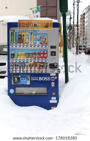 SAPPORO, JAPAN - FEBRUARY 11: Vending machine in the snow after the snow storm Sapporo, Japan on February 11, 2014. Japan has the highest number of vending machines per capita,