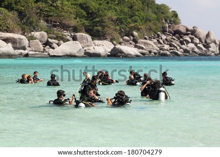 KOH TAO, THAILAND -MARCH 2: Unidentified group of people learn Scuba diving at Koh Tao , Thailand on March 2, 2014.Koh Tao is  one of  the biggest  scuba diving school in the world.