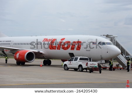 UDONTHANI, THAILAND - MARCH 27 2015: Unidentified group of people walked to Thai Lion Air airplane in Udonthani airport , on March 27, 2015.