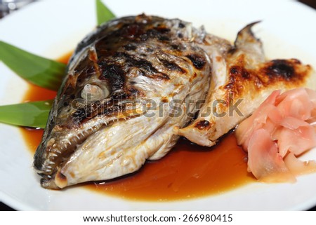 background of japanese food salmon kabutoni or steamed salmon head with soy sauce
