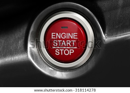 close up on a car start button