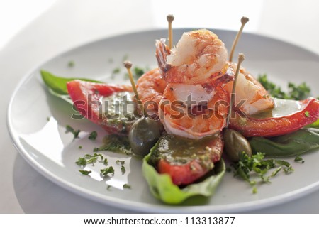 beautiful dish with tasty shrimp in tomato sauce