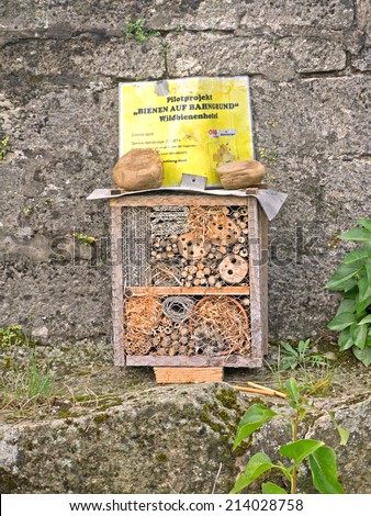 PFAFFSTAETTEN, AUSTRIA - 31 AUGUST 2014: An insect hotel was set up on a rail tunnel. The sign states, that it is part of the pilot project \