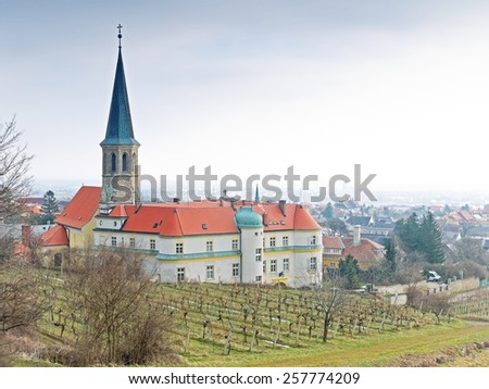 Gumpoldskirchen, AUSTRIA - 17  February 2015: The German Order resides in the castle of Guntramsdorf, Lower Austria. The castle is also a well-known landmark.