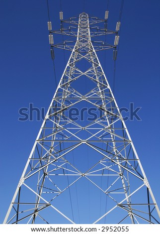 electrical power line tower agaist clear blue sky