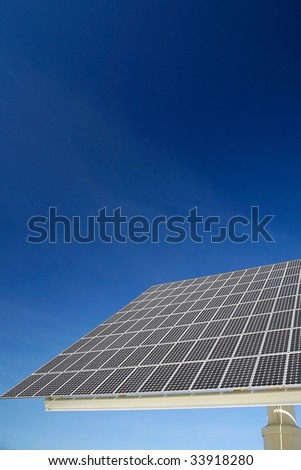 Solar panel against blue sky. Good for issues such as renewable energies, air pollution, global warming.