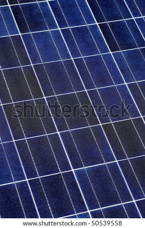 Modern solar photo voltaic panel close up with great blue cells details in a perspective view. Great for energy and environment themes.