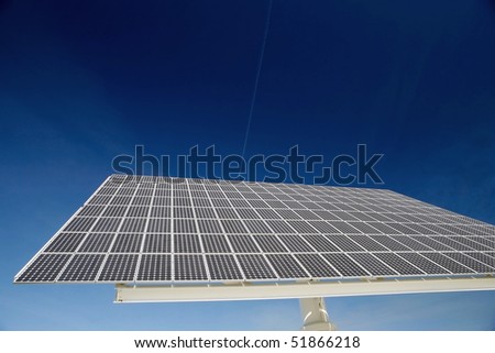 Solar panel against blue sky. Good for issues such as renewable energies, air pollution, global warming.