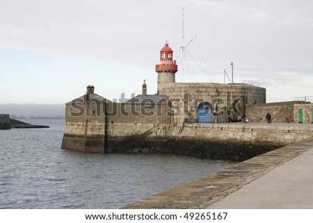 photo of a lighthouse on the  Ireland coast