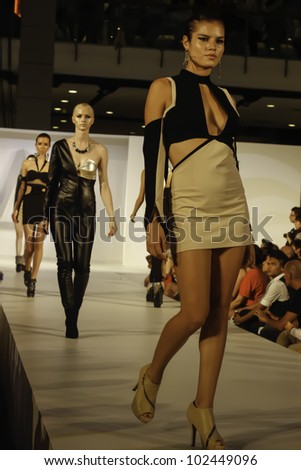 BANGKOK - MAY 2 : A model wears clothes by Thai fashion students at the fashion design contest on May 2 2012 at CTW Bangkok Thailand. Accademia Italiana teams up with f.fashion to organize this event.