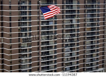 American Flag in front of Apartment Building