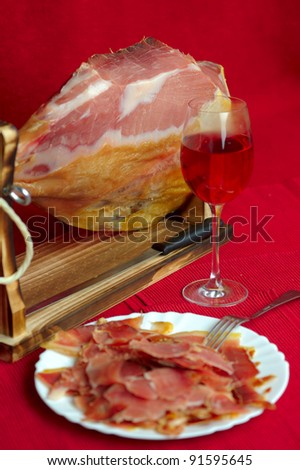 Jamon serrano. A Spanish ham isolated over white