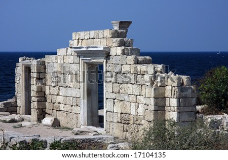 Old wall of the house against the sea