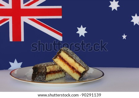 Delicious jam-filled lamington, a traditional Australian cake, with Australian flag background
