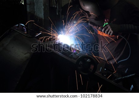 Sparks from welding, working with the heat
