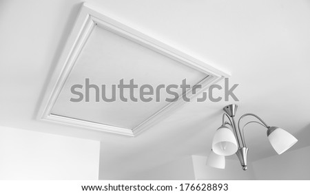 Picture of a loft hatch in white painted room