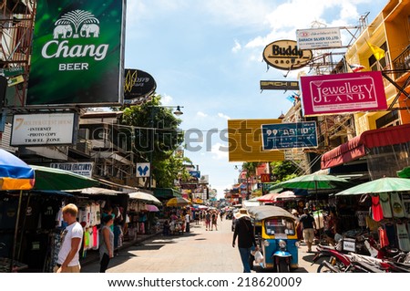 Tourists walk along backpacker haven Khao San Road as officials warn visas on arrival may be rolled back in the wake of recent terrorism incidents on Aug 24, 2014 in Bangkok, Thailand.