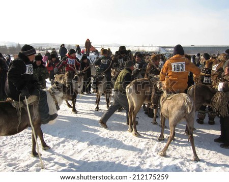 NERUNGRI, RUSSIA - MARCH 4: Racing on deer during the celebration of the reindeer herder in Yakutia on March 4, 2006 in Nerungri.