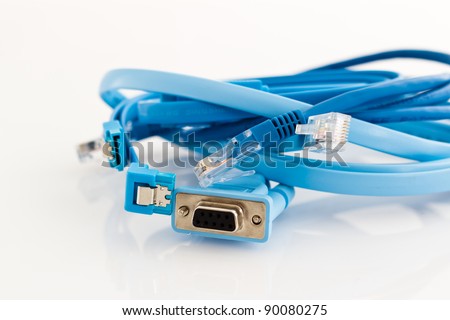various blue pc cables - SATA cable, ethernet cable and cable to configure routers, switches and other network devices through the serial port