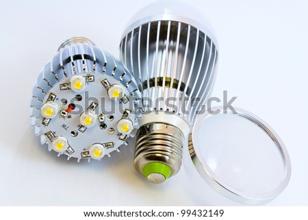 two LED light bulbs with 1 Watts SMD chips one of them  without cover glass