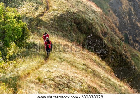 CHIANGMAI, THAILAND-DEC 2014:Undefinite people walking on the way in alpine forest highland mountain.