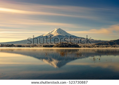 Fuji,Famous Japan mountain,Fujisan snow mountain sunrise and water reflection landmark landscape,vintage color effect.