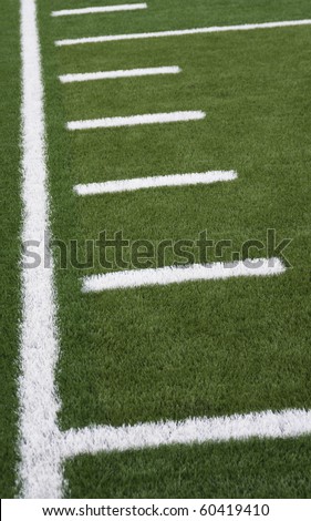 Sideline and yard markers on an American football field