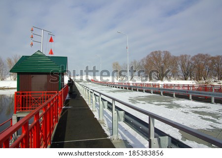 Pontoon bridge in the old Russian city Kolomna in winter day