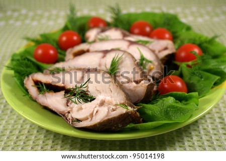 Smoked fish with vegetables on a platter