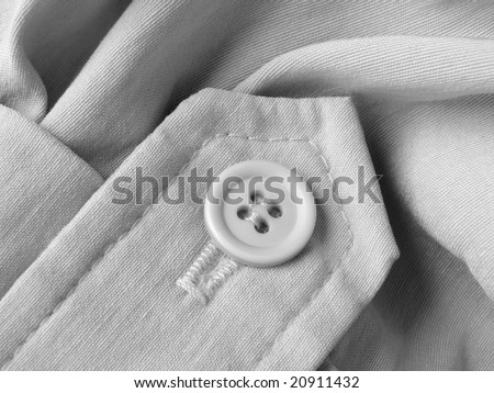 linen clothes fragment with button