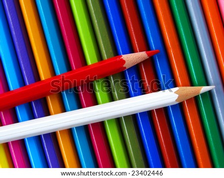 red and white pencils on the colorful ones set background
