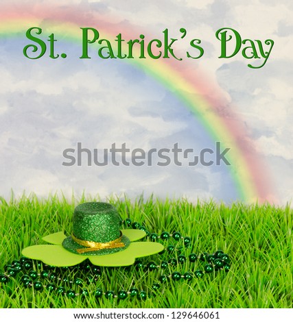 A St Patrick\'s day arrangement with a hat, shamrock and rainbow
