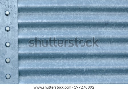 A background of corrugated galvanized metal from a grain storage bin