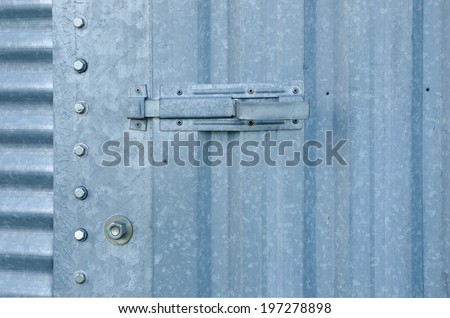 A background of corrugated galvanized metal from a grain storage bin