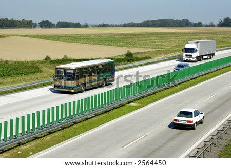Car, truck and bus on highway