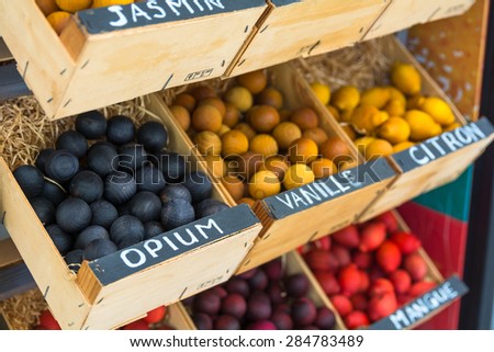 Scented wooden balls for sale at farmers market or souvenirs shop