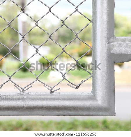 Mesh fence with silver border