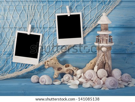 Marine life decoration and  instant photos on blue shabby background