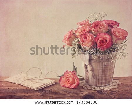 Pink Roses On Wooden Desk