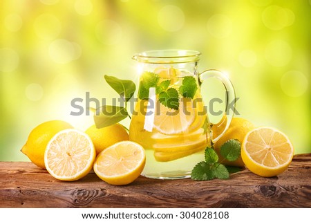 Summer lemon drink on a wooden table
