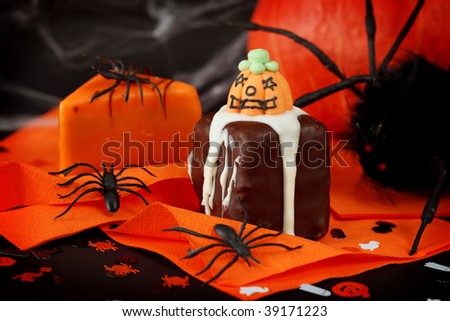 Halloween cakes on orange serviette