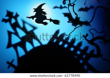 Halloween night with witch,bat and house