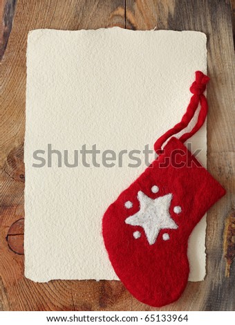 Letter for santa with old parchment and christmas stocking