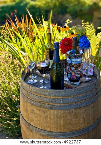 Drinks prepared in a backyard at the barrel decorated as a serving table