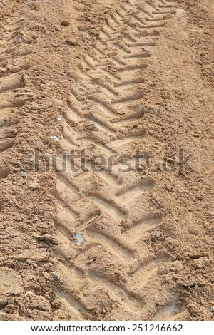 pattern of wheels tracks on the soil
