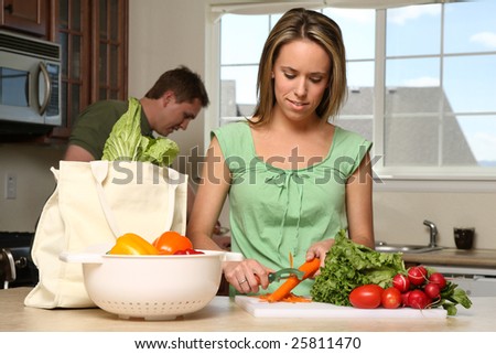 girl making vegetable salad
